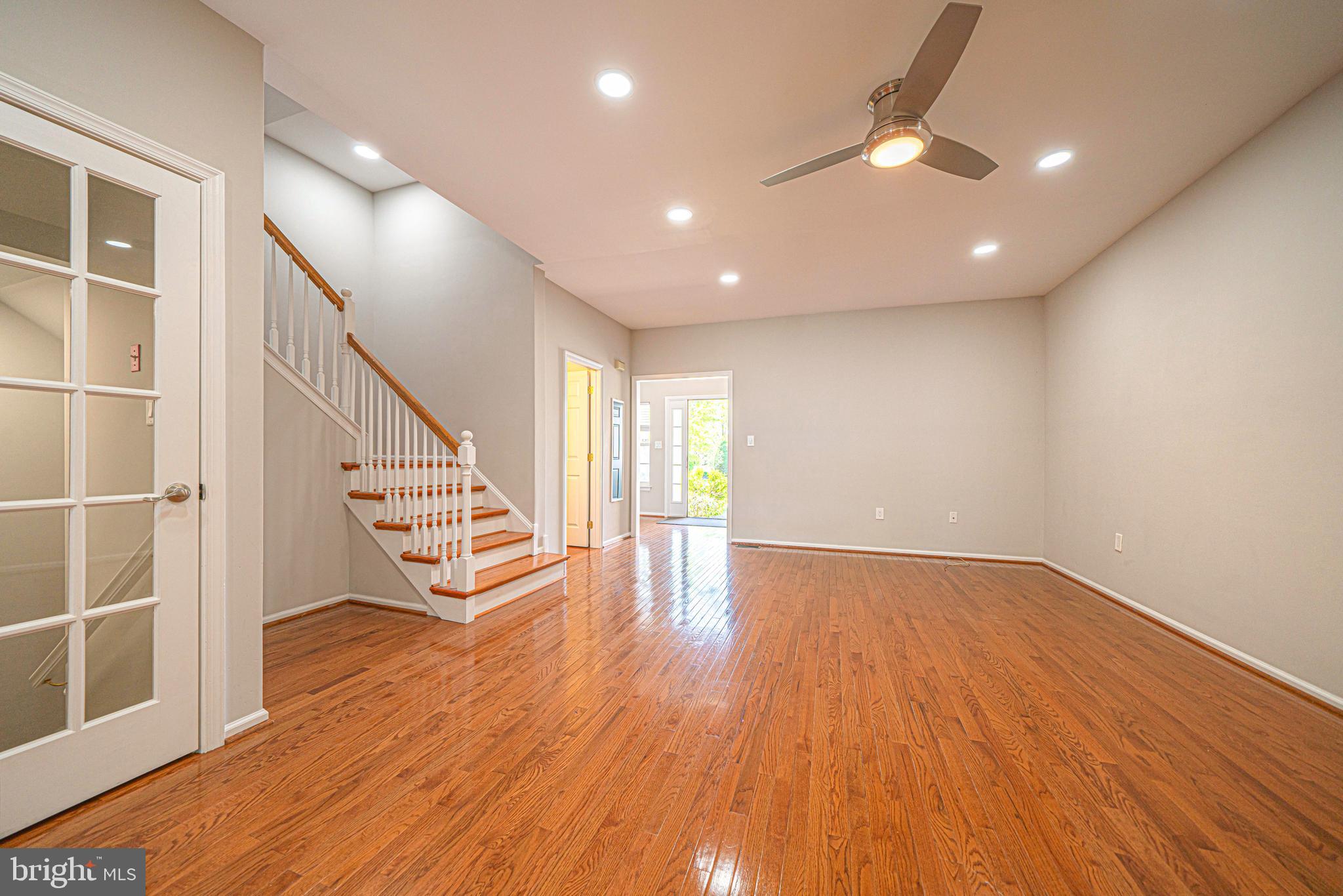 54 Arbor Circle Colmar, PA 18915 - Photo 12 of 74 an empty room with wooden floor and windows