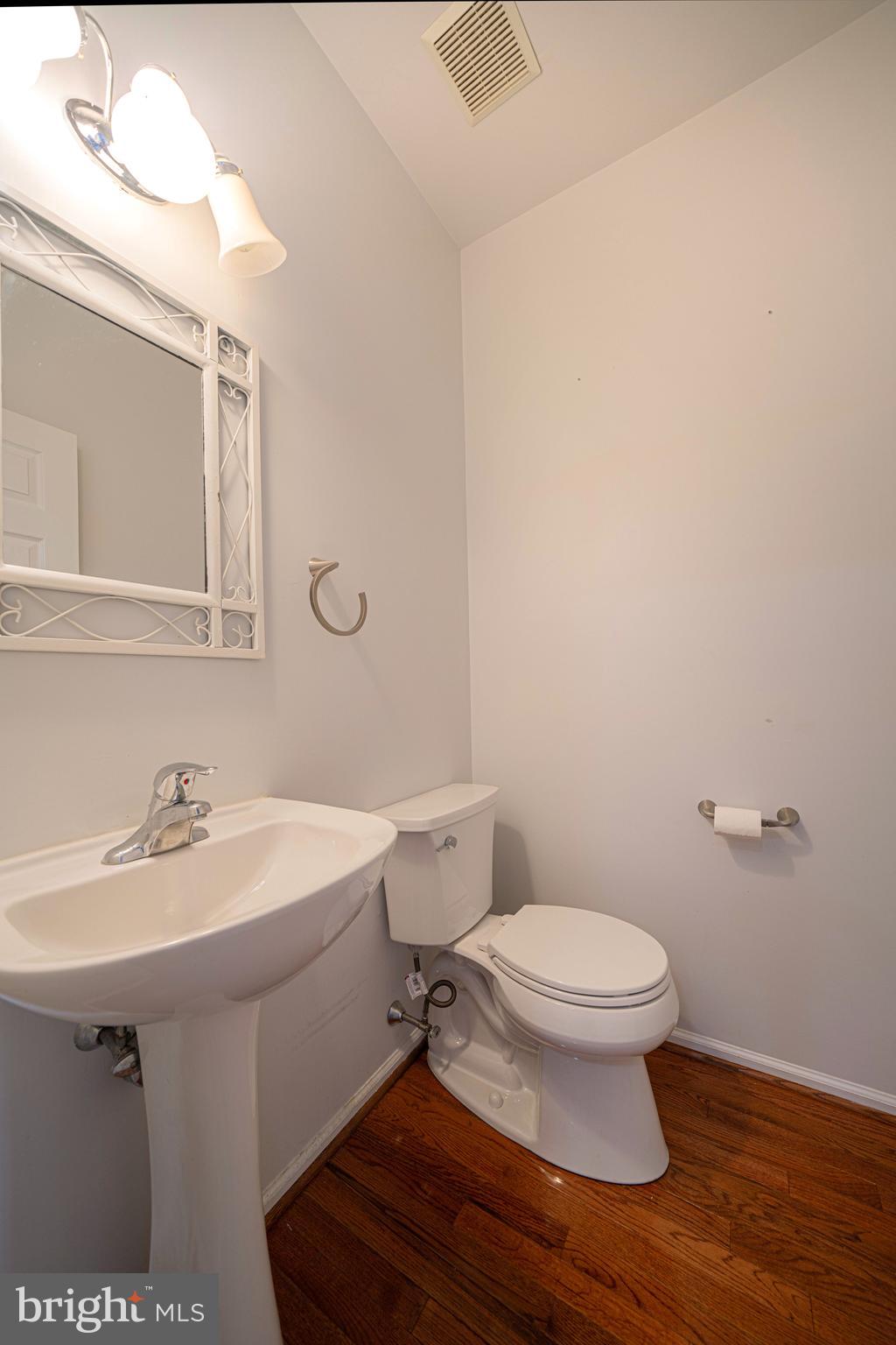 54 Arbor Circle Colmar, PA 18915 - Photo 29 of 74 a bathroom with a sink toilet and a mirror