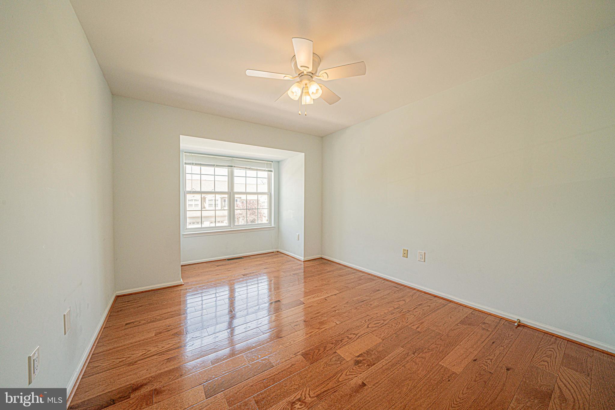 54 Arbor Circle Colmar, PA 18915 - Photo 44 of 74 wooden floor in an empty room with a window