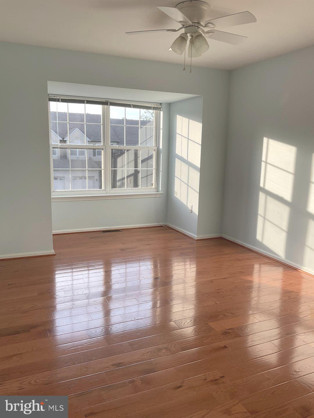 54 Arbor Circle Colmar, PA 18915 - Photo 54 of 74 a view of empty room with wooden floor and fan