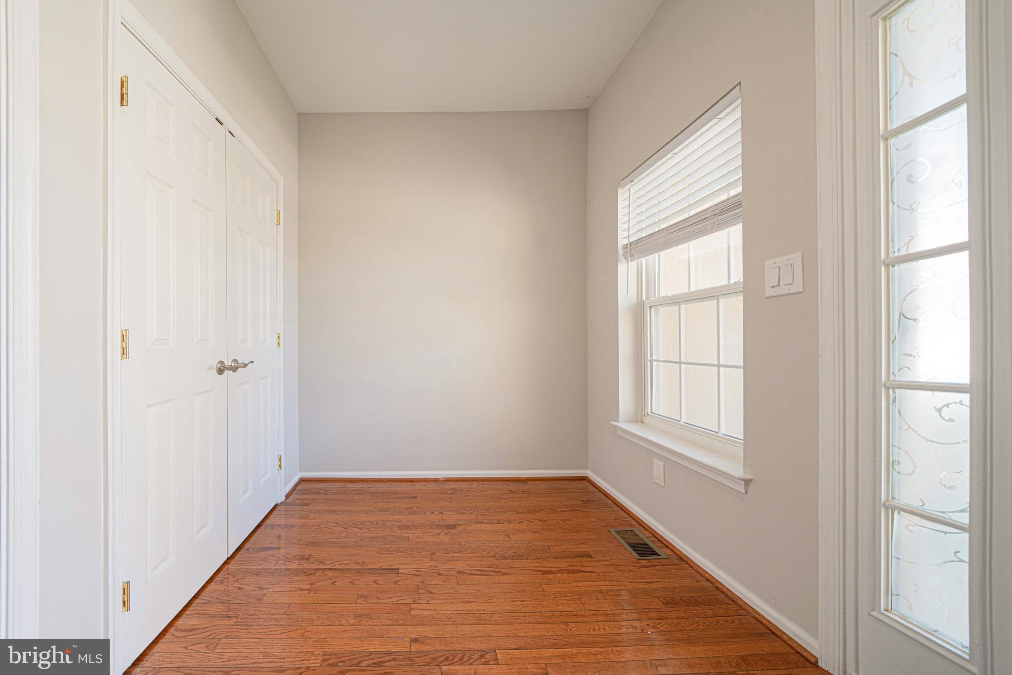 54 Arbor Circle Colmar, PA 18915 - Photo 8 of 74 an empty room with wooden floor and windows
