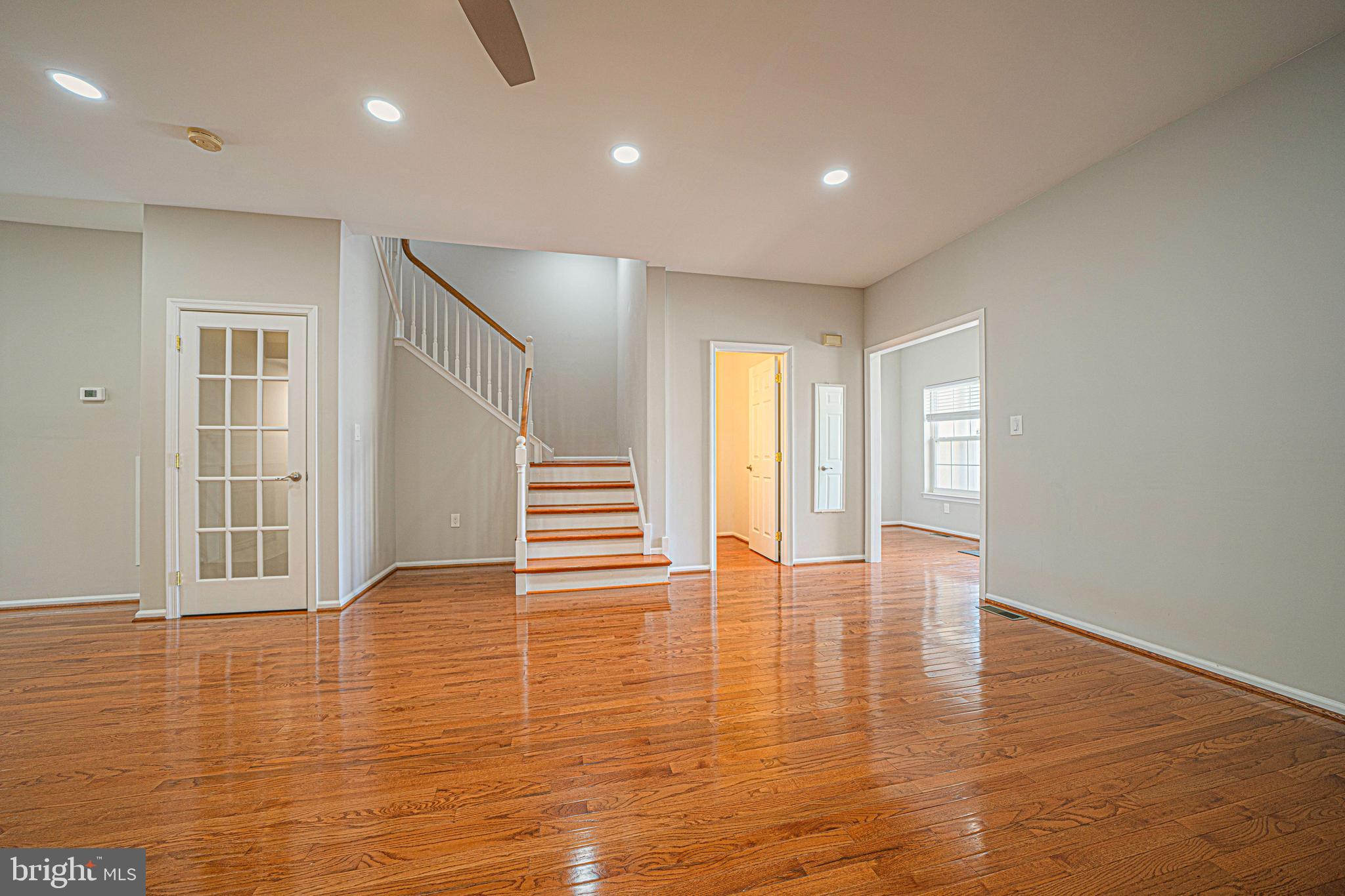 54 Arbor Circle Colmar, PA 18915 - Photo 9 of 74 an empty room with wooden floor and windows