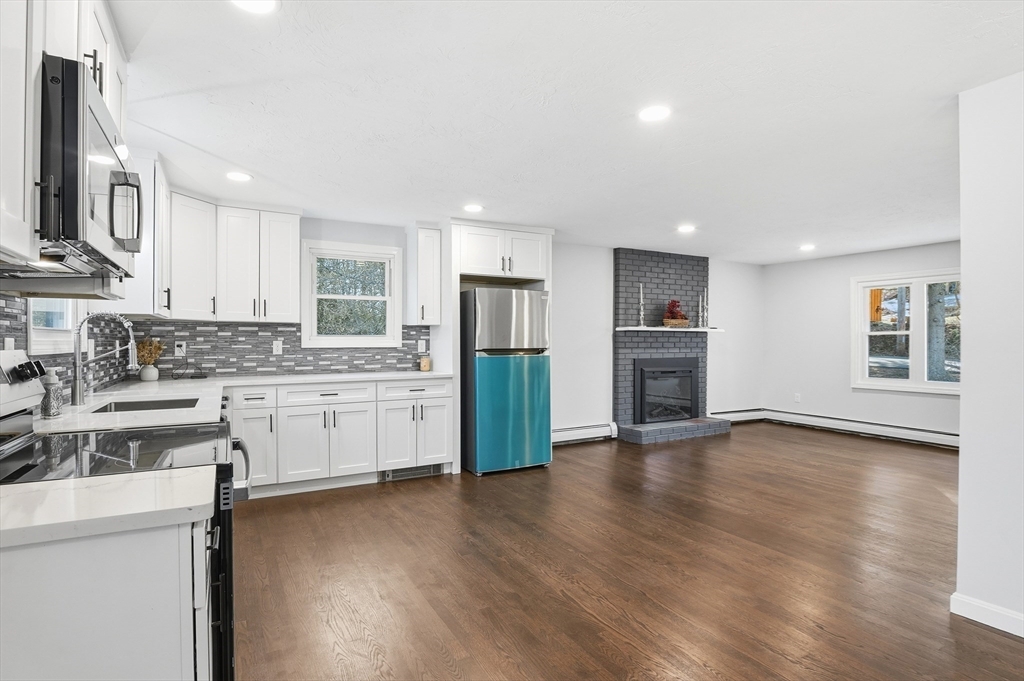 2 Laurel Lane Spencer, MA 01562 - Photo 14 of 42 a kitchen with stainless steel appliances a refrigerator sink and cabinets