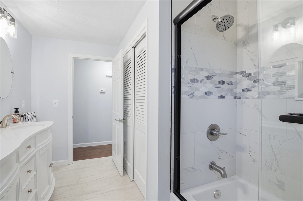 2 Laurel Lane Spencer, MA 01562 - Photo 26 of 42 a bathroom with a bathtub sink and mirror