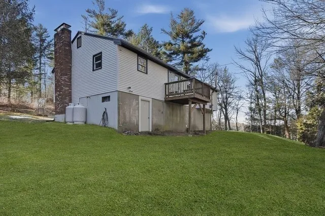 a view of a back yard of the house