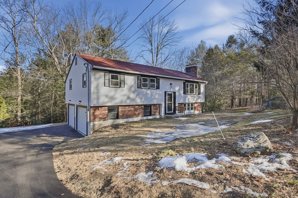 2 Laurel Lane Spencer, MA 01562 - Photo 4 of 42 a view of a house with a yard