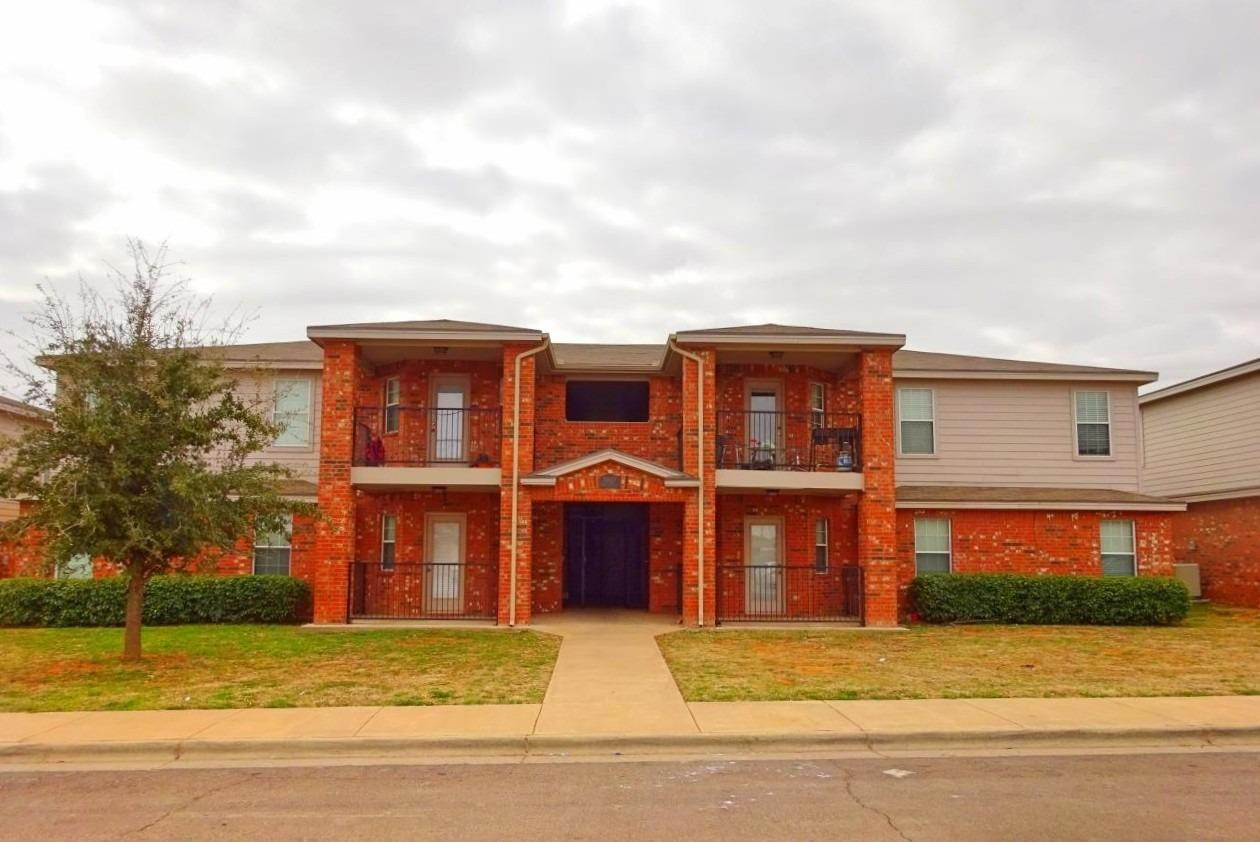 5827 6th Street, Unit A Lubbock, TX 79416 - Photo 1 of 10 a view of houses with a street