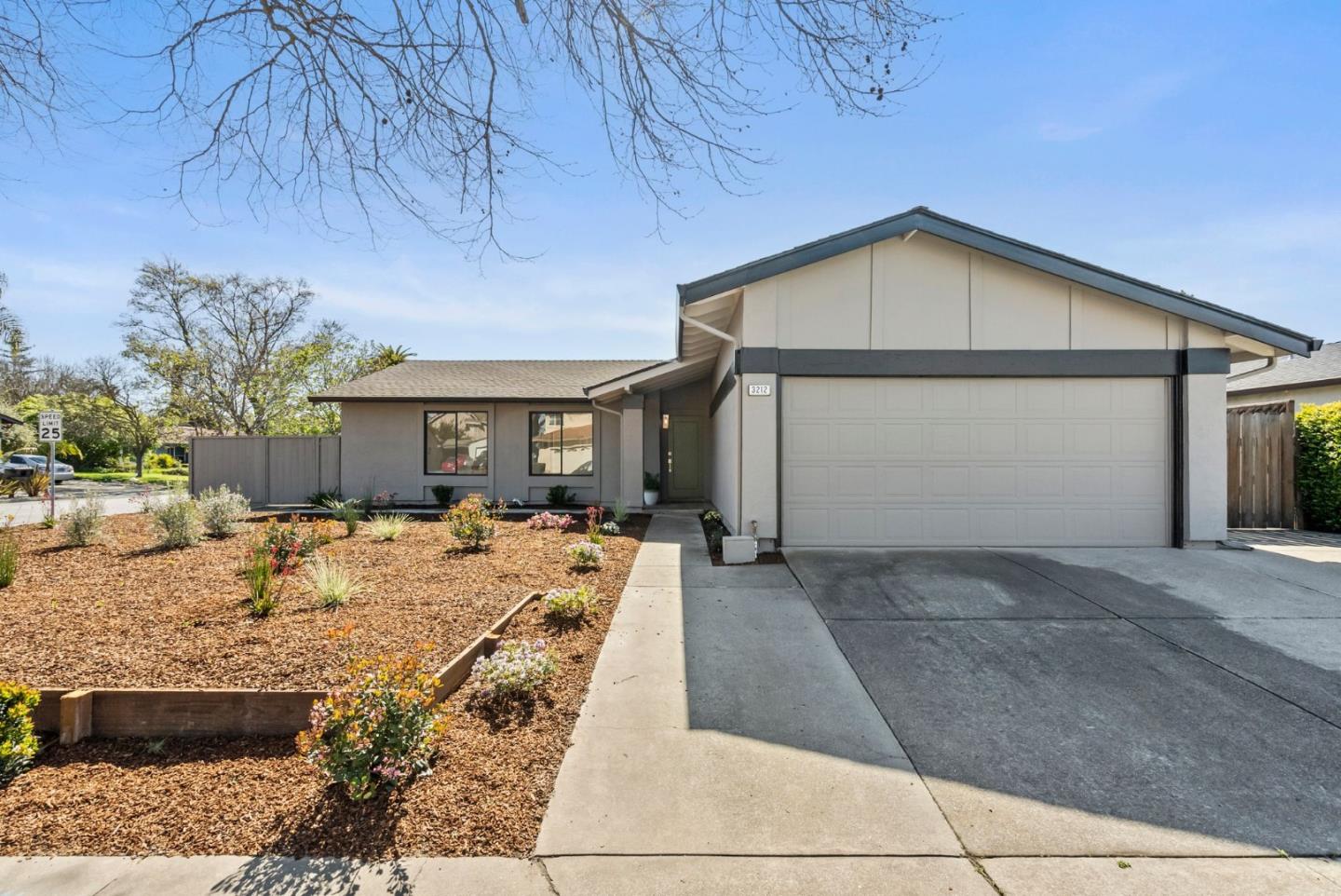 3212 Beard Road Fremont, CA 94555 - Photo 2 of 22 a view of house with backyard and trees in the background
