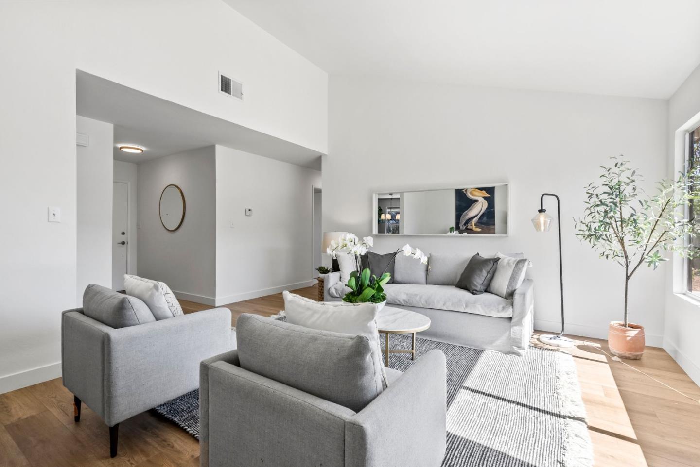 3212 Beard Road Fremont, CA 94555 - Photo 4 of 22 a living room with furniture and wooden floor