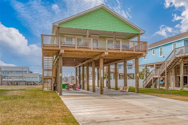 a view of a house with wooden stairs