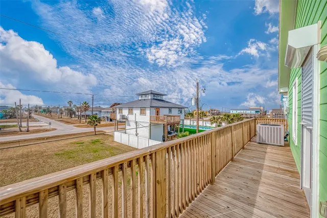 a view of a balcony with city view