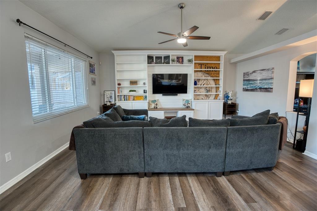4303 Orange Ridge Court Valrico, FL 33596 - Photo 19 of 40 a living room with furniture and a flat screen tv