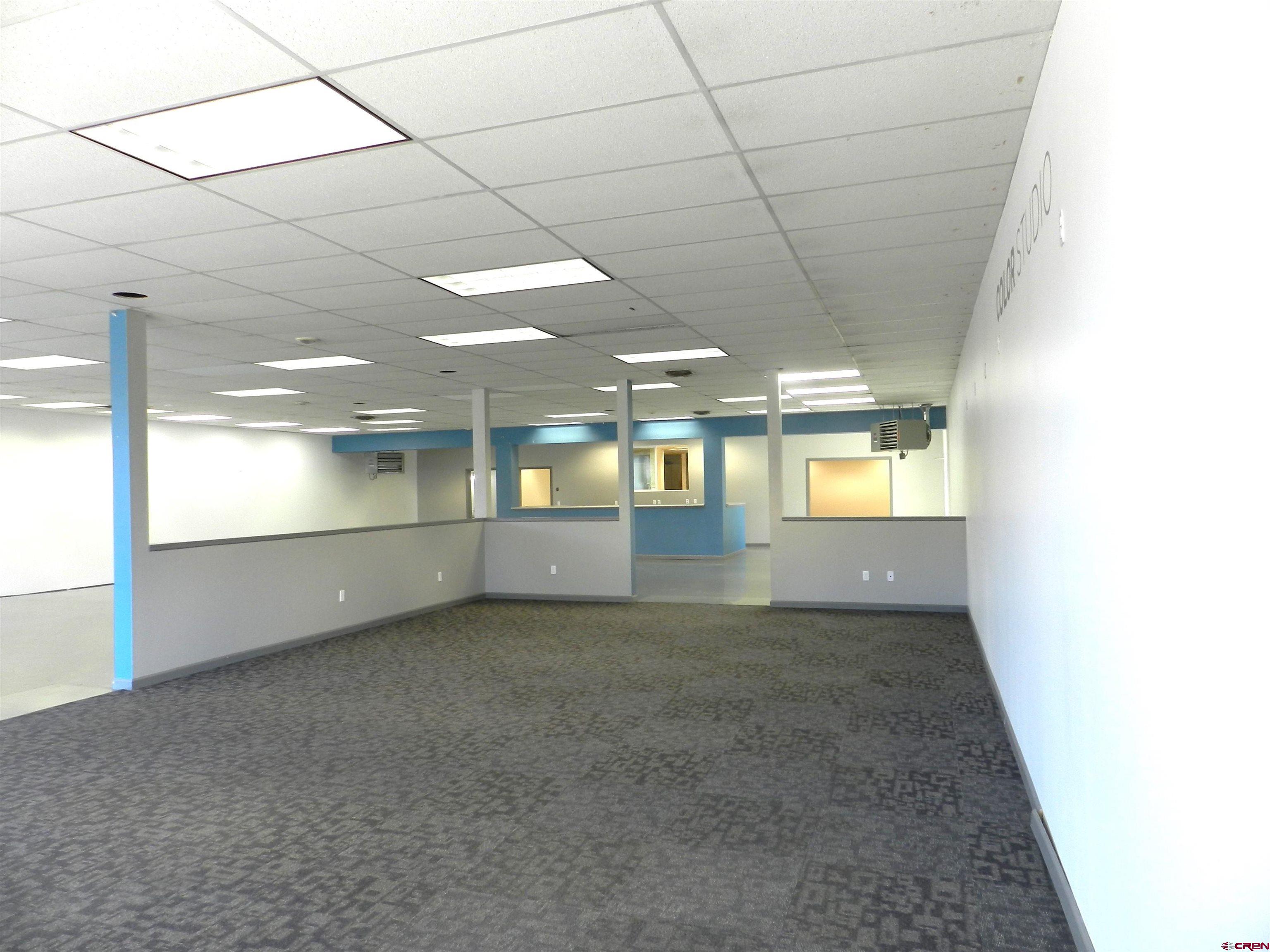 202 East Main Street Montrose, CO 81401 - Photo 11 of 29 a view of an empty room with a window
