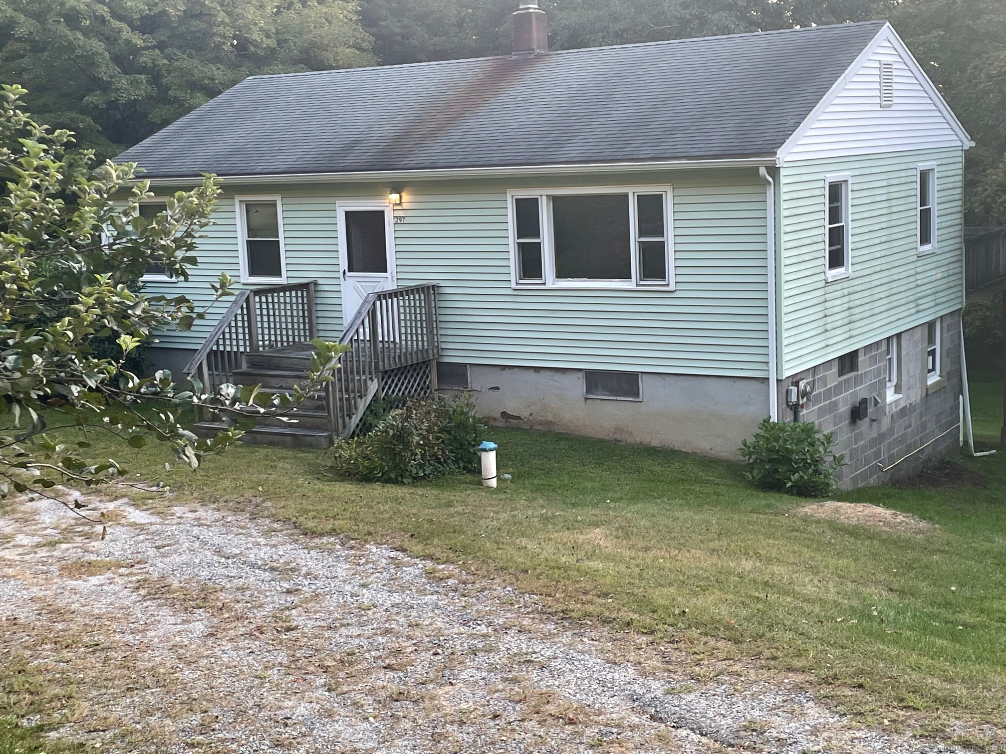 297 Stoddard Road Morris, CT 06763 - Photo 1 of 1 a view of a house with a yard