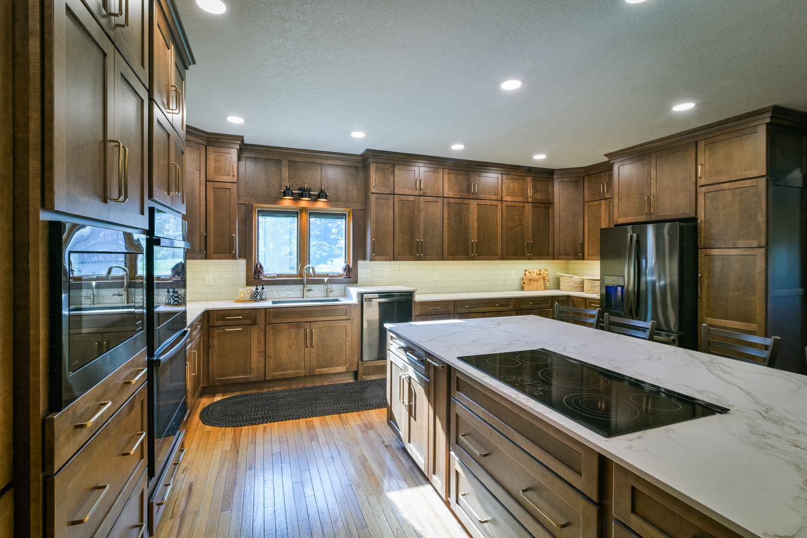 4789 Leghorn Road Clinton, IL 61727 - Photo 12 of 84 a kitchen with stainless steel appliances granite countertop a refrigerator and a stove