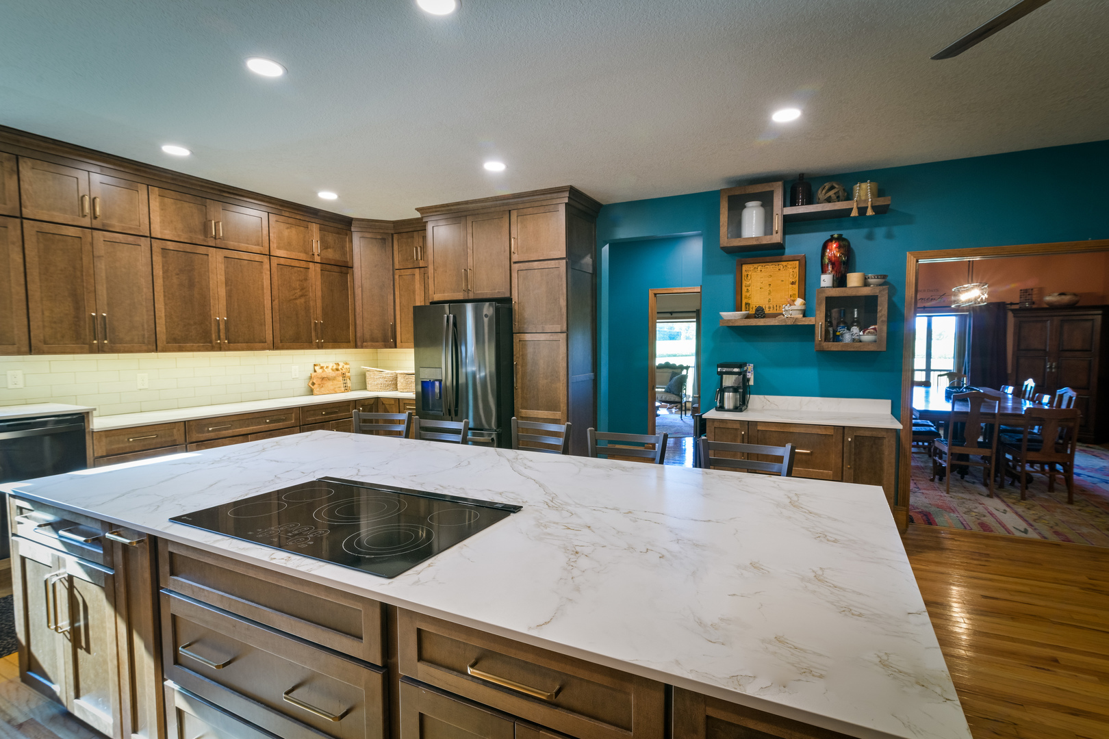 4789 Leghorn Road Clinton, IL 61727 - Photo 15 of 84 a kitchen with stainless steel appliances a sink a table and chairs
