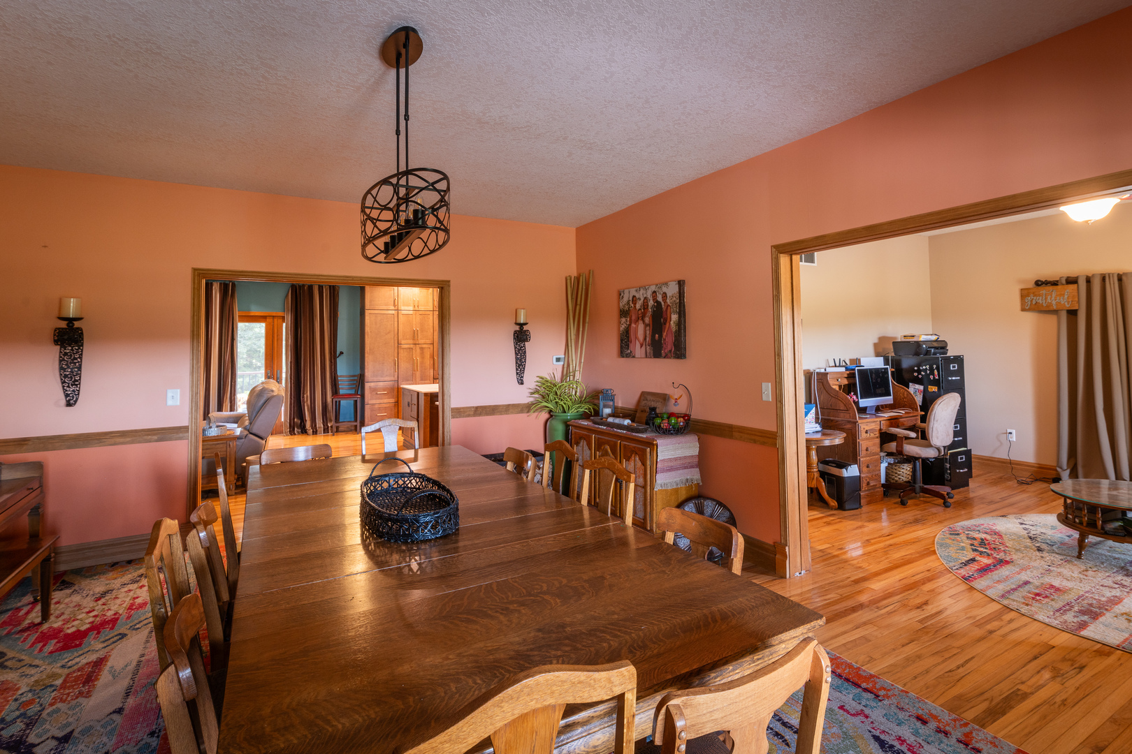4789 Leghorn Road Clinton, IL 61727 - Photo 17 of 84 a living room with furniture a dining table and chairs with wooden floor