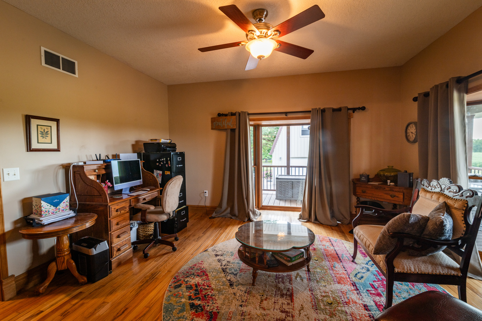 4789 Leghorn Road Clinton, IL 61727 - Photo 19 of 84 a living room with furniture and a large window