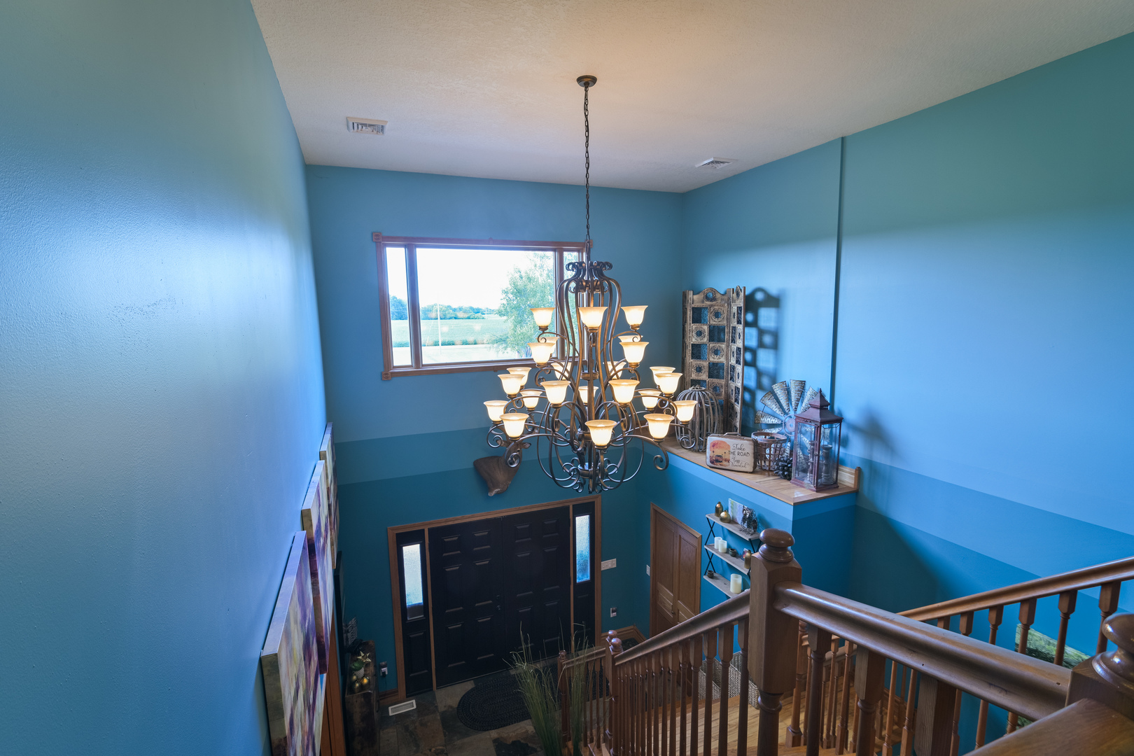 4789 Leghorn Road Clinton, IL 61727 - Photo 27 of 84 a view of a dining room with furniture and chandelier