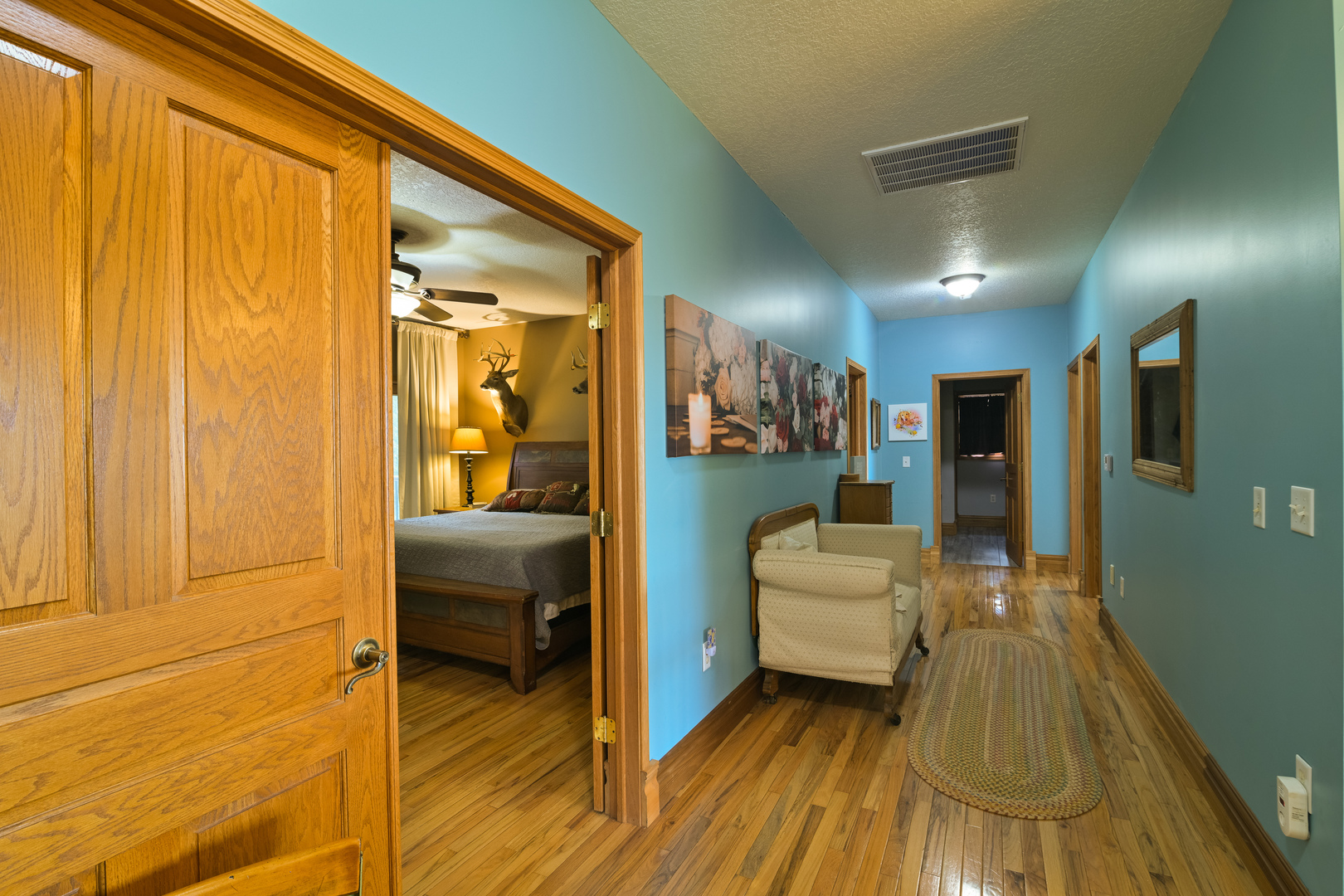 4789 Leghorn Road Clinton, IL 61727 - Photo 28 of 84 a bedroom with furniture and a wooden floor