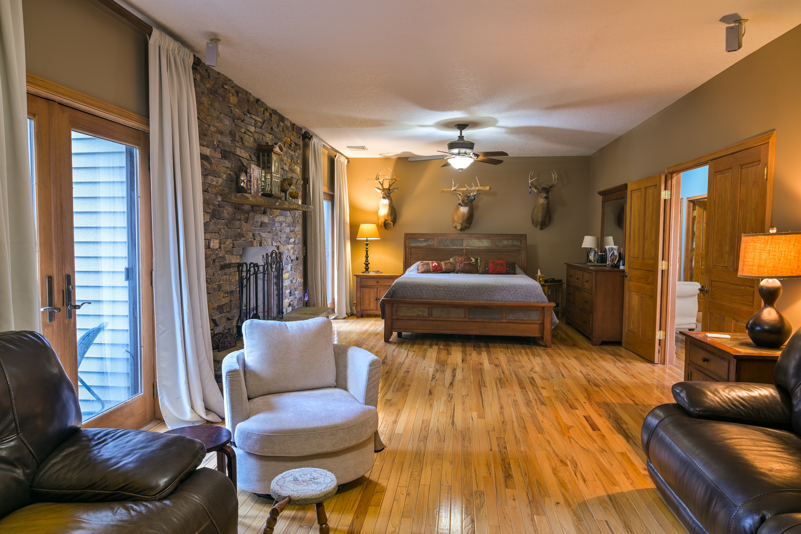 4789 Leghorn Road Clinton, IL 61727 - Photo 30 of 84 a bedroom with a bed and wooden floor