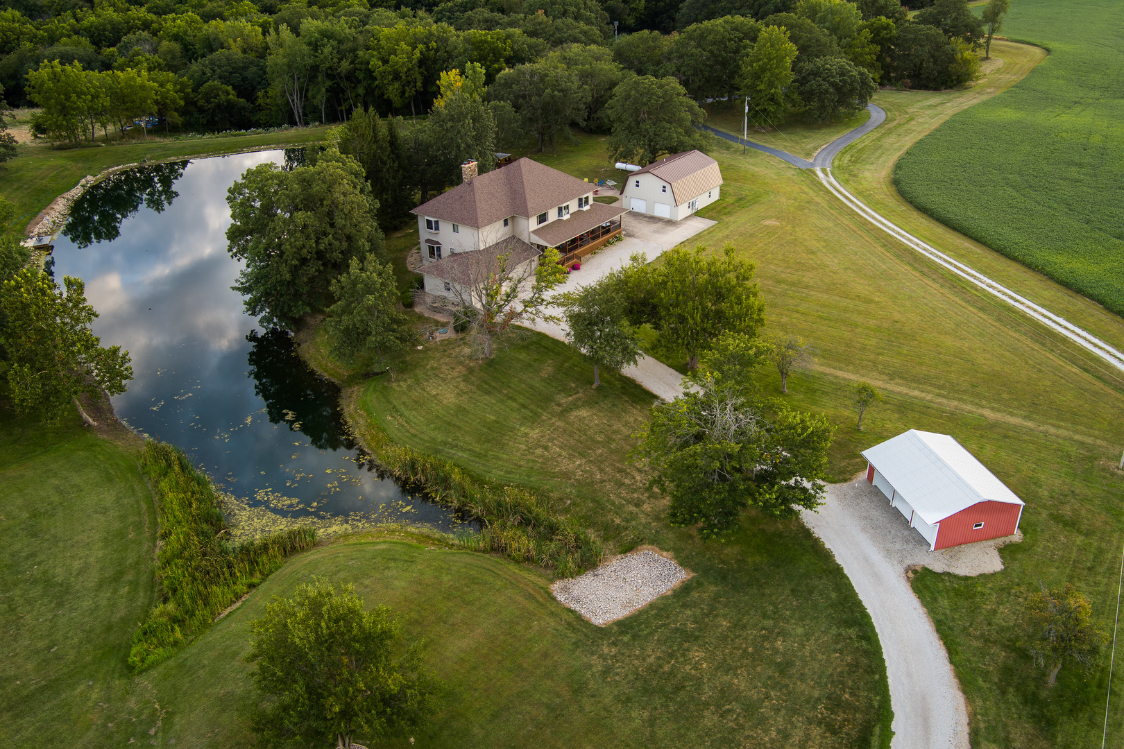 4789 Leghorn Road Clinton, IL 61727 - Photo 3 of 84 an aerial view of a house with outdoor space swimming pool and outdoor seating