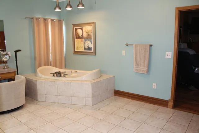 a room with furniture and a flat screen tv