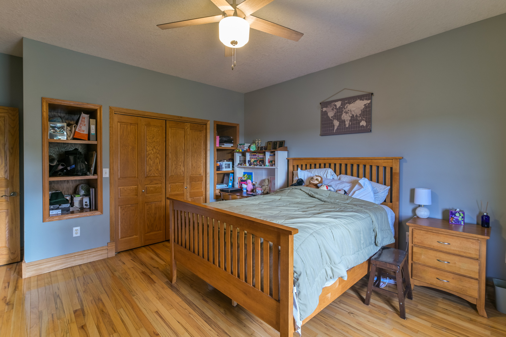 4789 Leghorn Road Clinton, IL 61727 - Photo 41 of 84 a bedroom with bed and a chandelier