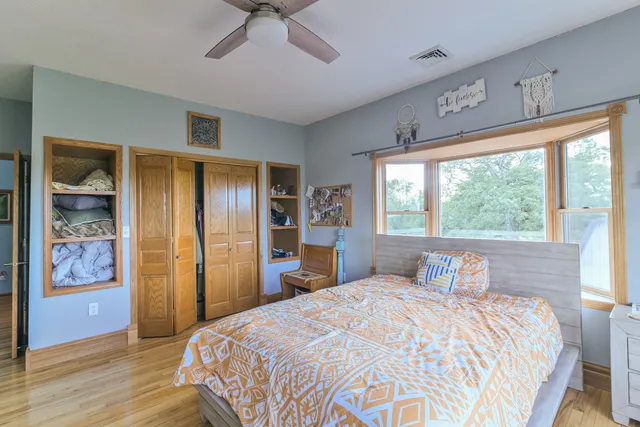 a view of a house with sitting area and garden
