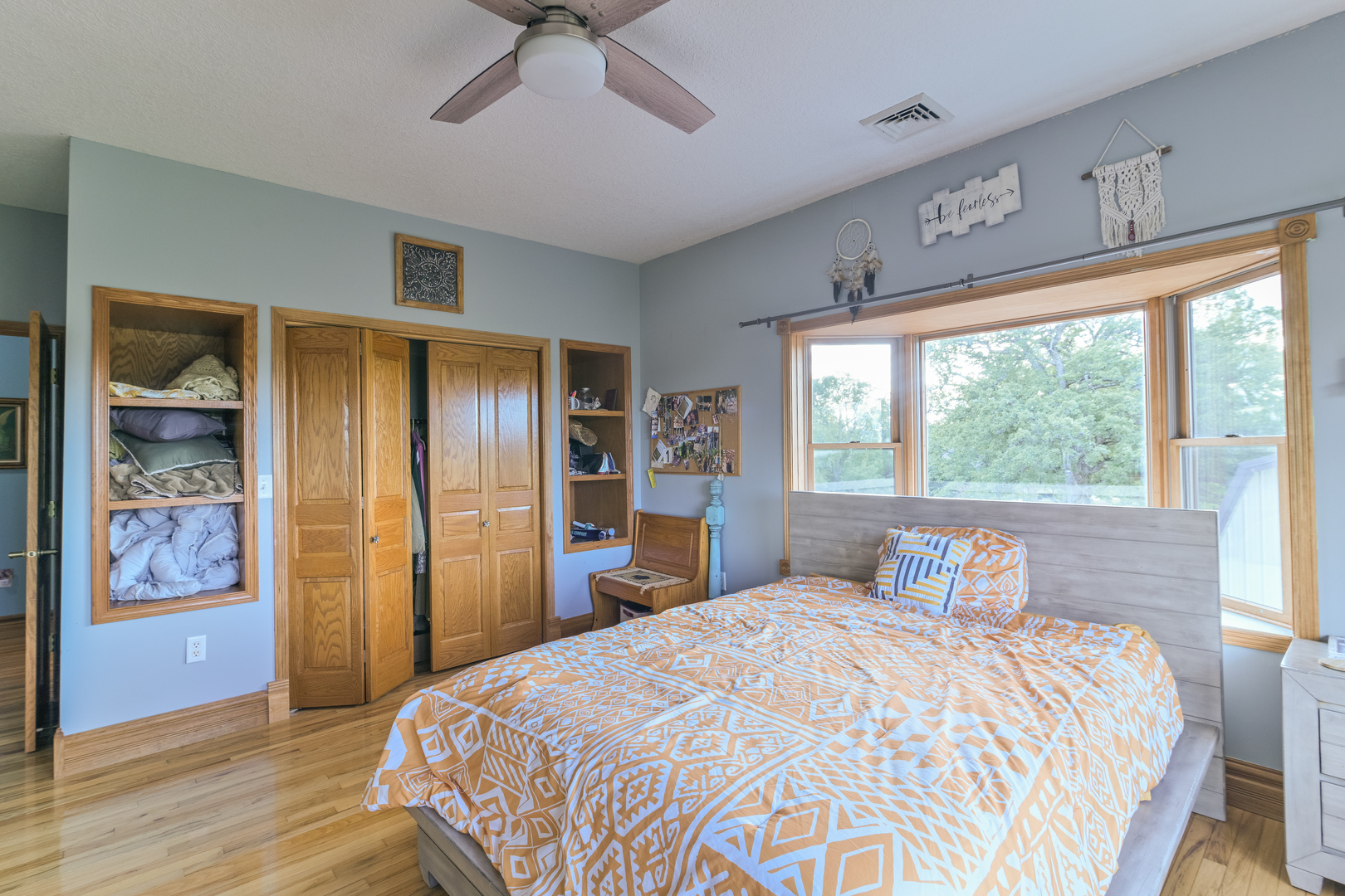 4789 Leghorn Road Clinton, IL 61727 - Photo 42 of 84 a bedroom with a large bed and a window