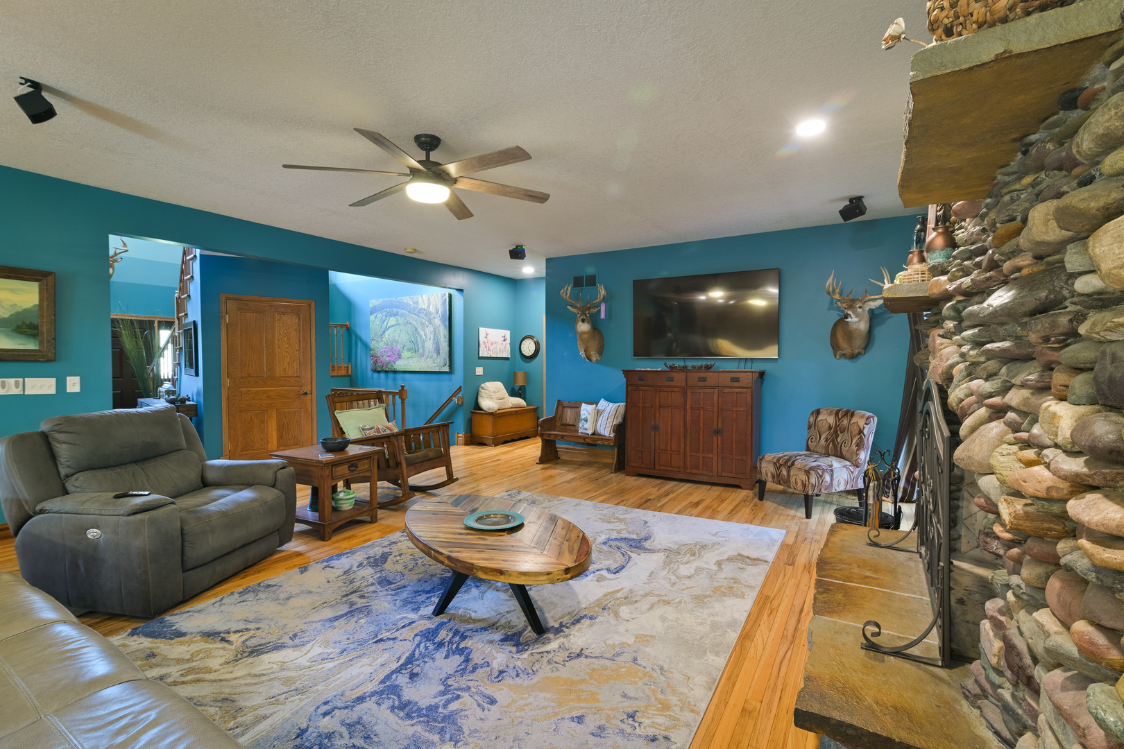 4789 Leghorn Road Clinton, IL 61727 - Photo 8 of 84 a living room with furniture and a flat screen tv