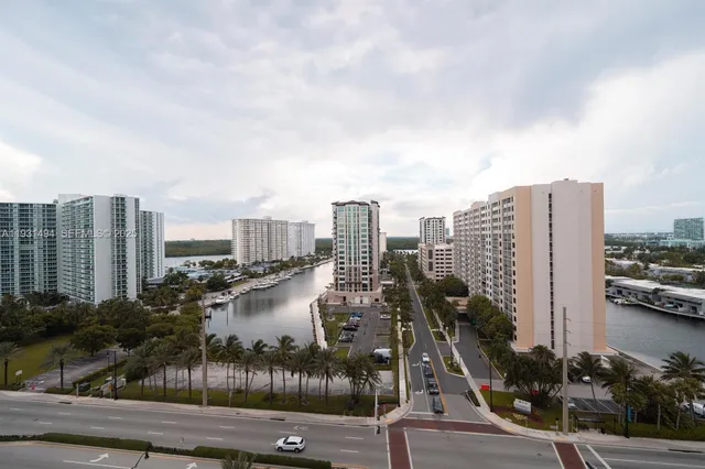 a view of a city with tall buildings