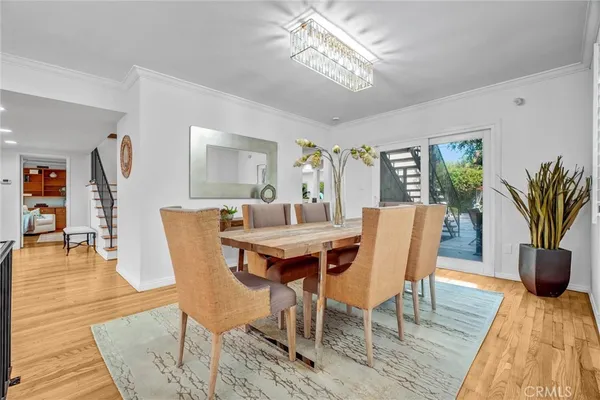 a kitchen with stainless steel appliances granite countertop a refrigerator and a stove