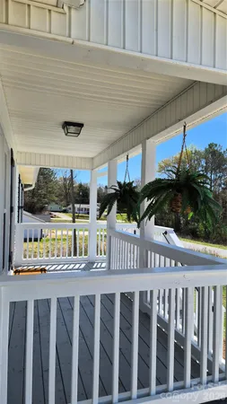 a view of a back yard from a balcony