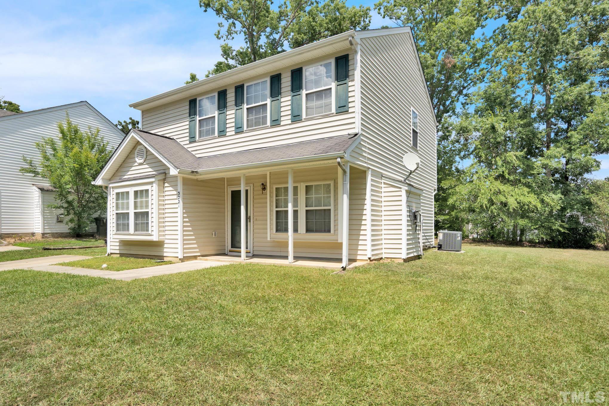 3221 Mango Drive Raleigh, NC 27610 - Photo 2 of 3 a front view of a house with a yard
