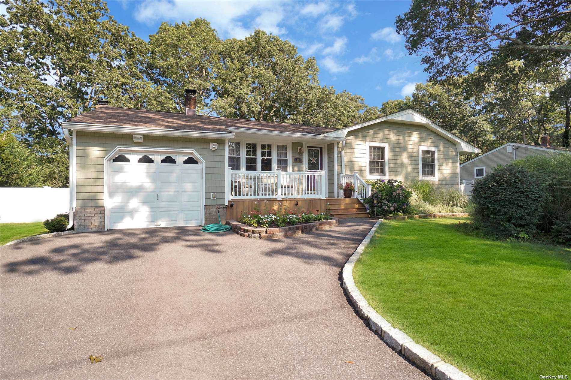 39 Crescent Bow Ridge, NY 11961 - Photo 1 of 1 front view of a house with a yard