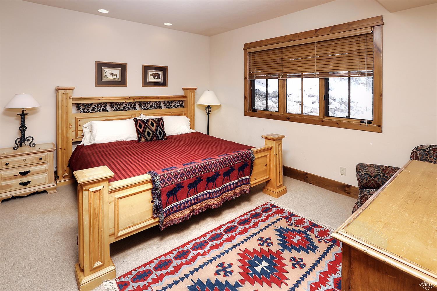 161 Fall Creek Road Edwards, CO 81632 - Photo 11 of 16 a bedroom with a bed and window