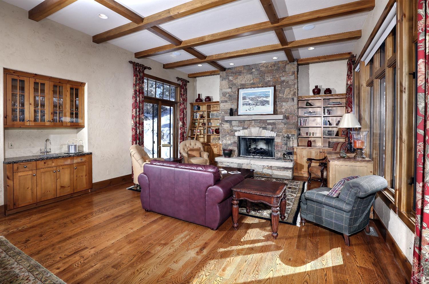 161 Fall Creek Road Edwards, CO 81632 - Photo 3 of 16 a living room with furniture and a fireplace