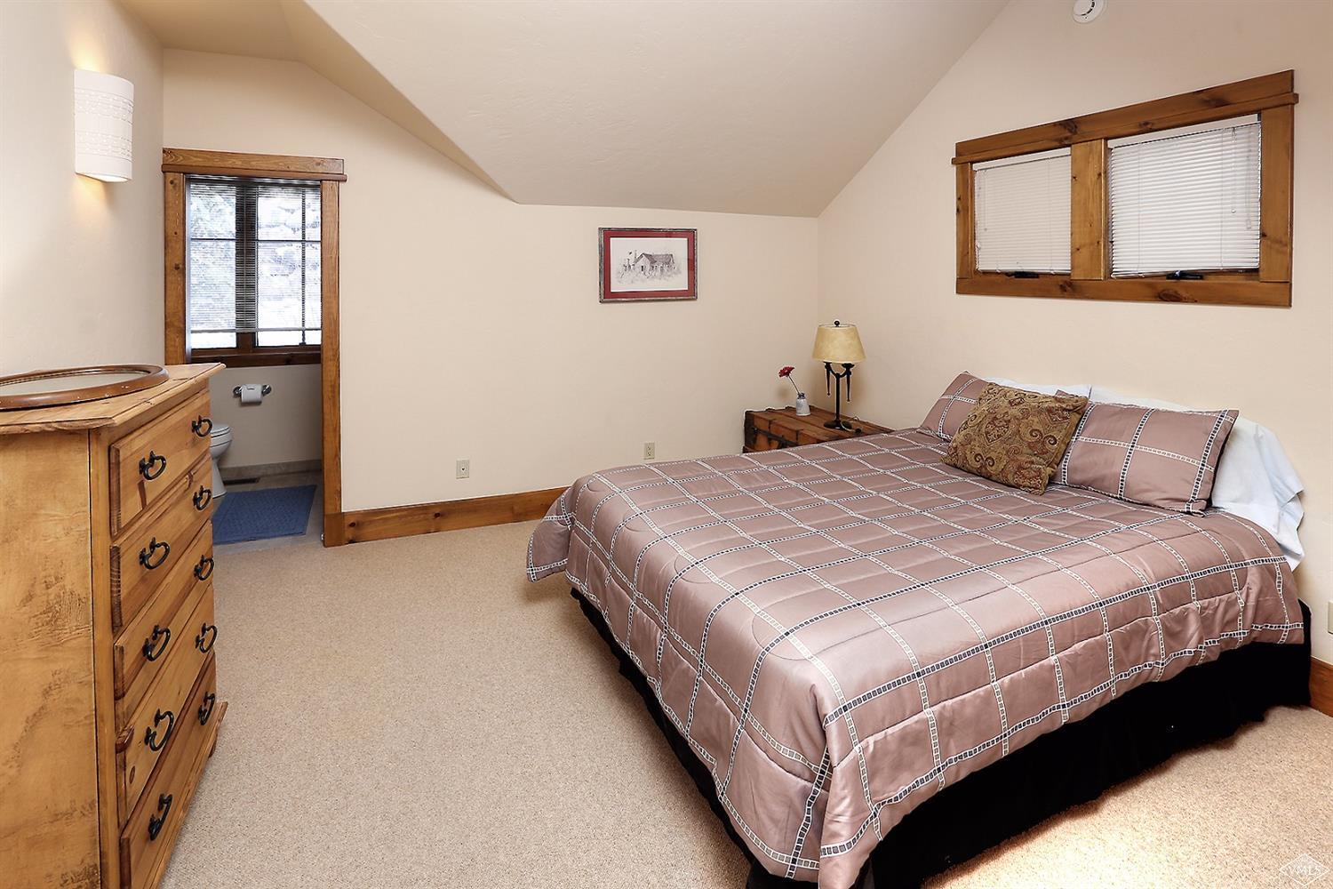 161 Fall Creek Road Edwards, CO 81632 - Photo 9 of 16 a bedroom with a bed and window