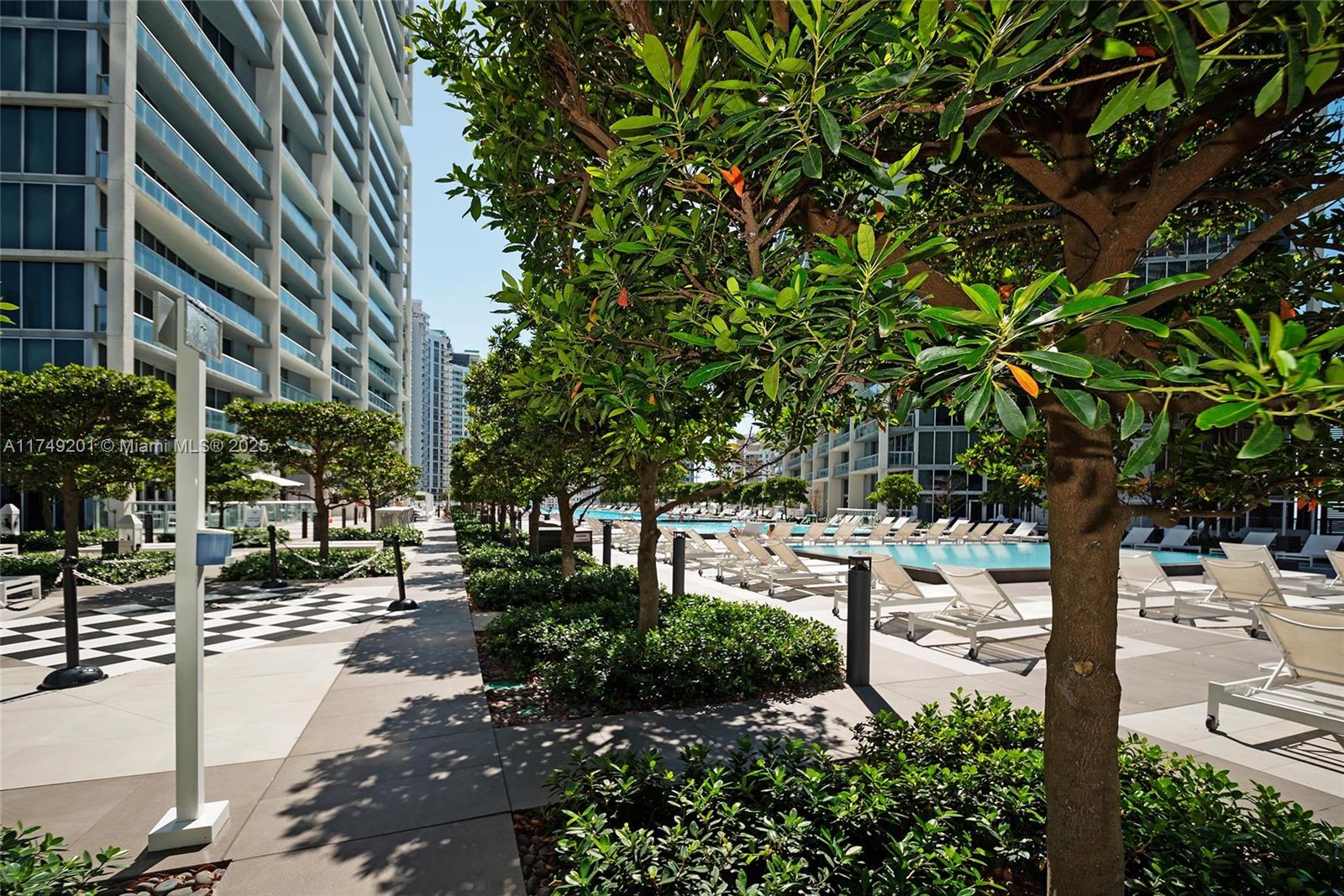 485 Brickell Avenue, Unit 2603 Miami, FL 33131 - Photo 2 of 16 a view of street with houses and trees