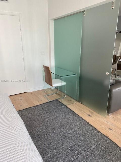 485 Brickell Avenue, Unit 2603 Miami, FL 33131 - Photo 10 of 16 a bathroom with a granite countertop sink and a toilet