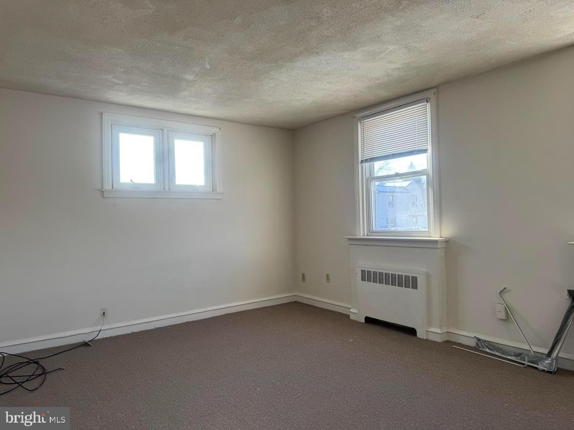 7901 Cedarbrook Avenue Philadelphia, PA 19150 - Photo 2 of 5 an empty room with a window