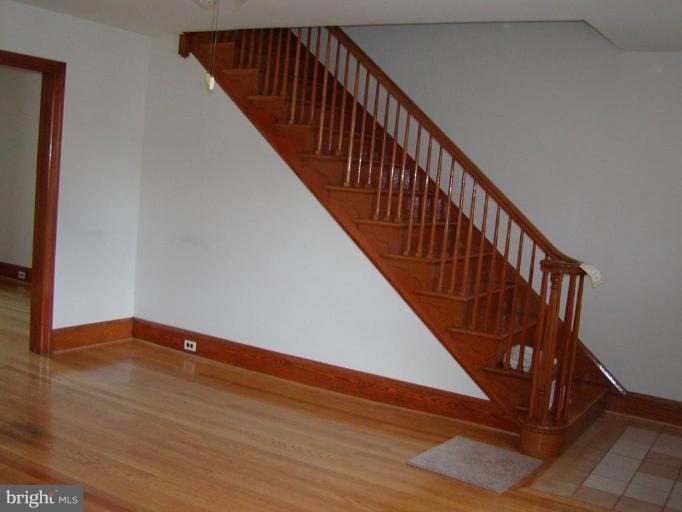 920 Calwell Road Baltimore, MD 21229 - Photo 4 of 5 a view of entryway with wooden floor