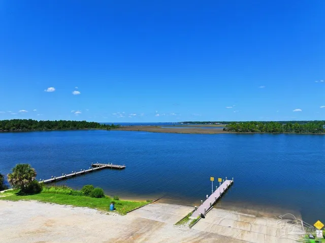 a view of a lake and a yard