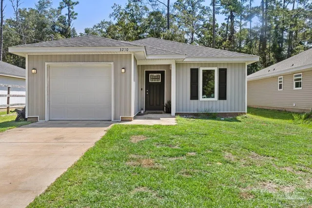 a view of a house with garden