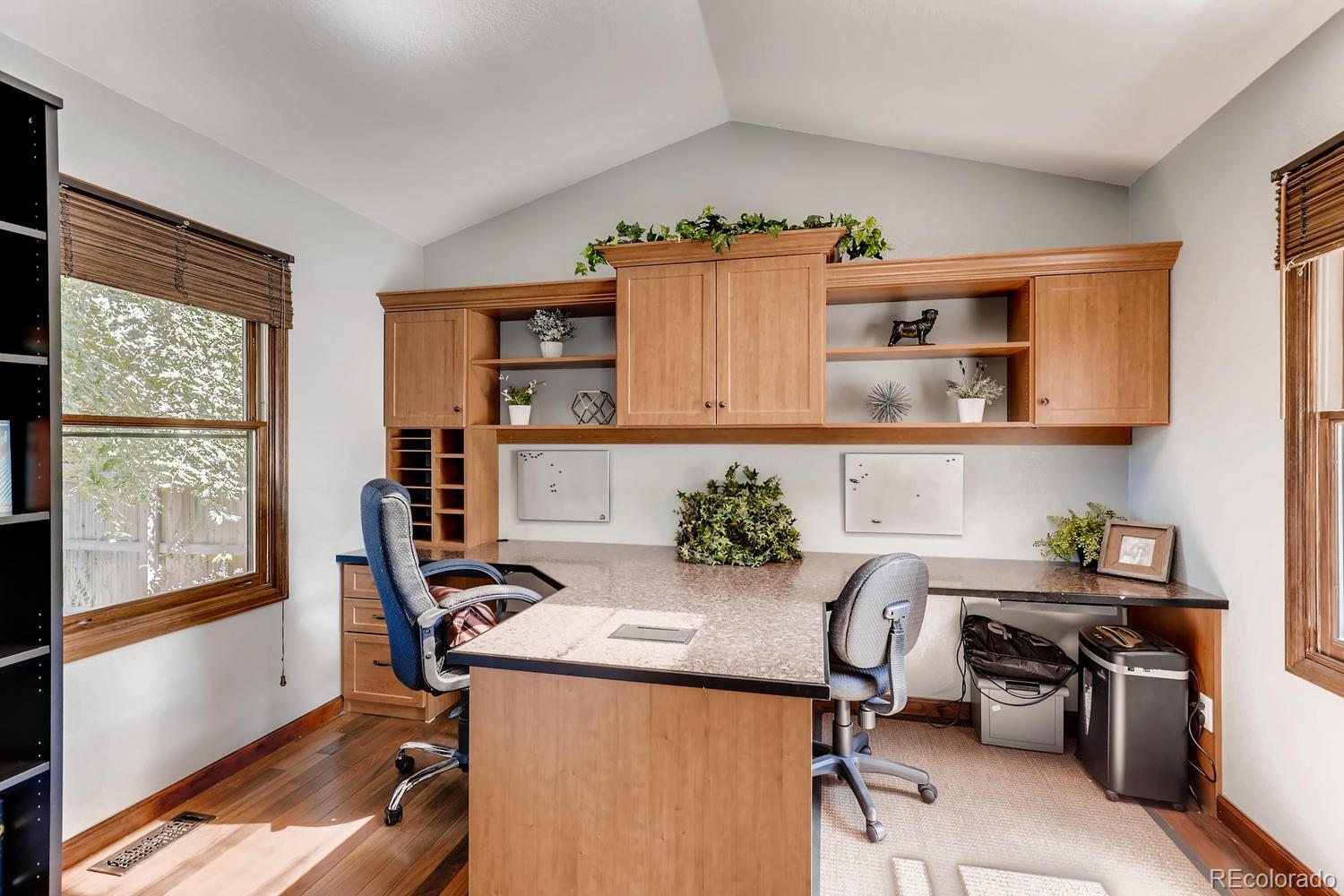 8267 Sweet Water Road Lone Tree, CO 80124 - Photo 9 of 24 a view of a workspace with furniture and a window