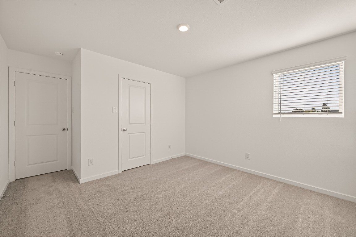 21926 Sam Raburn Drive Tomball, TX 77375 - Photo 25 of 47 a view of an empty room with a window