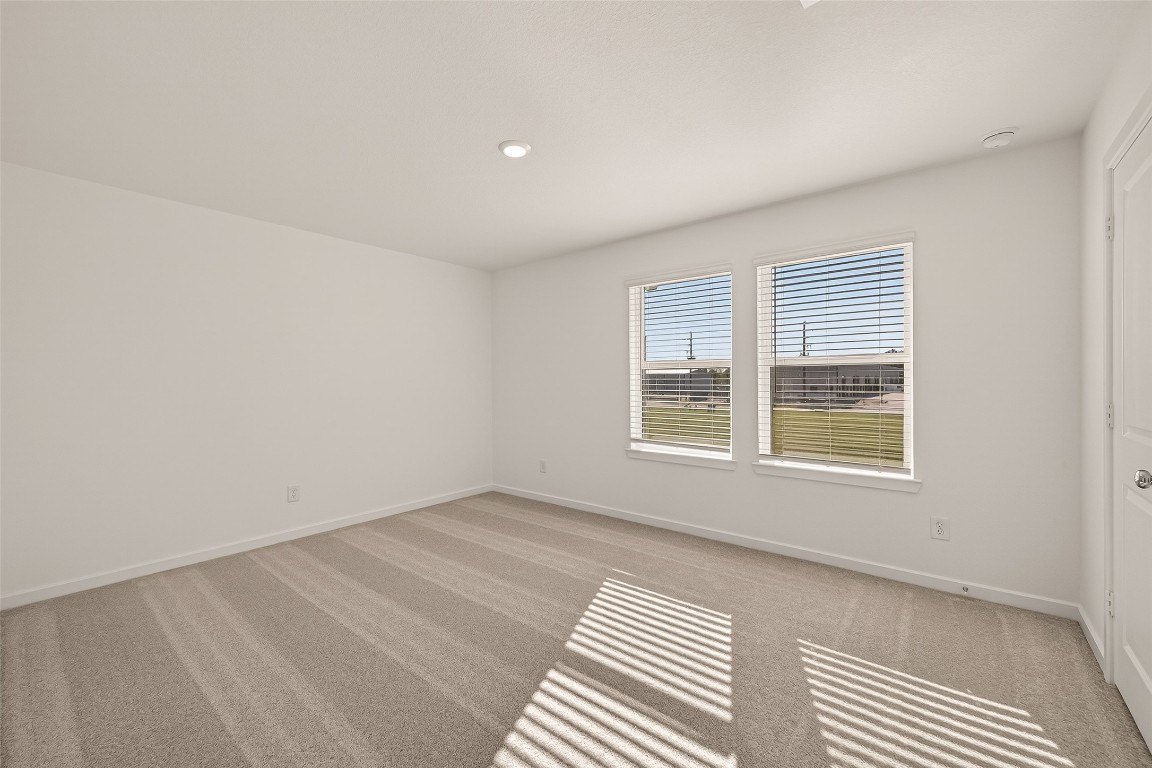 21926 Sam Raburn Drive Tomball, TX 77375 - Photo 26 of 47 a view of an empty room with a window
