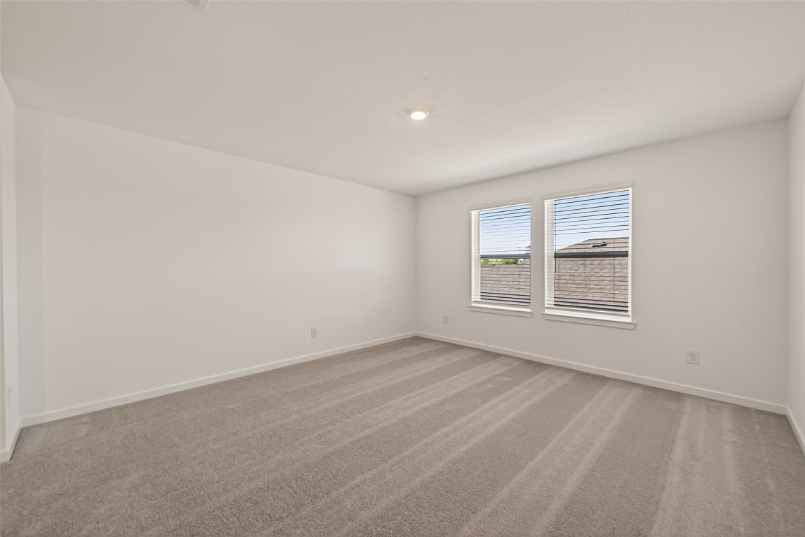 21926 Sam Raburn Drive Tomball, TX 77375 - Photo 32 of 47 a view of an empty room with a window