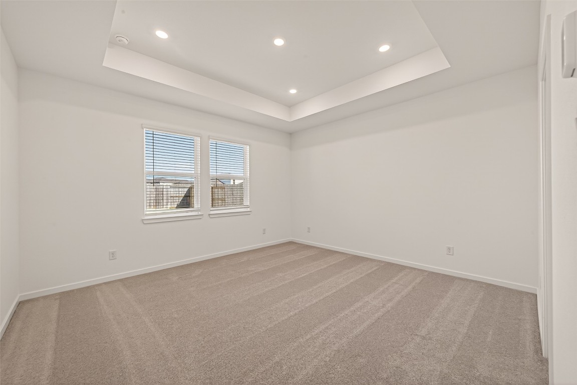 21926 Sam Raburn Drive Tomball, TX 77375 - Photo 33 of 47 an empty room with windows